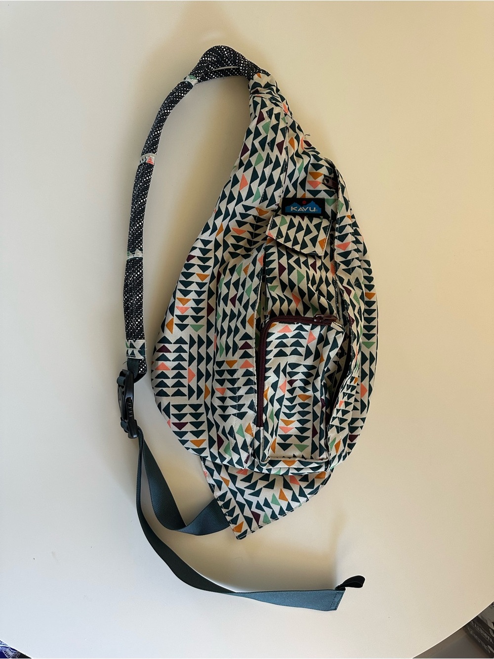 KAVU Geometric Triangle Sling Bag in White, Green, Navy, Orange